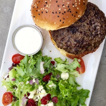 Eureka! - Bison burger with a side salad - American Near Me - Irvine, California Eureka! - Bison burger with a side salad - American Near Me - Irvine, California