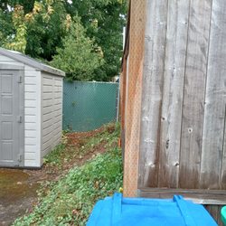 Precision Cut Construction - Fence now standing straight up
