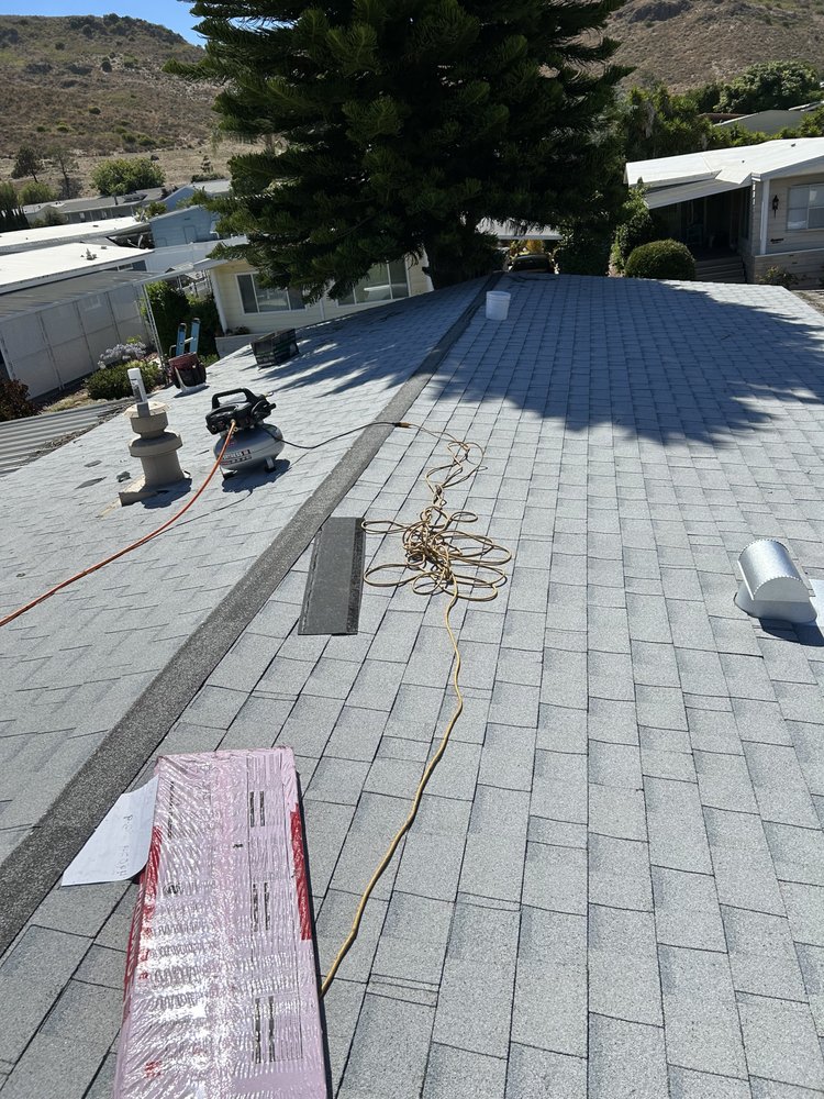 Slide of Molina’s Roofing