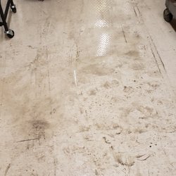 Albertsons - Filthy water all over the public area at the back of the store by the mark-down items.