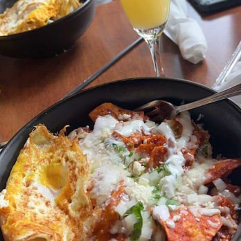 Toast Downey - Red chilaquiles with egg Orange juice mimosa - Breakfast & Brunch Near Me - Downey, California Toast Downey - Red chilaquiles with egg Orange juice mimosa - Breakfast & Brunch Near Me - Downey, California
