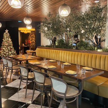 Carlino Restaurant - the dining area with the christmas tree in the background - Italian Near Me - Vancouver, British Columbia