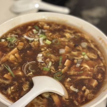 Bund Shanghai - a bowl of soup with a spoon - Shanghainese Near Me - San Francisco, California Bund Shanghai - a bowl of soup with a spoon - Shanghainese Near Me - San Francisco, California