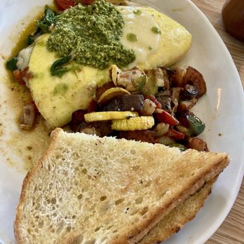 Golden Harvest - Tomato salad omelette with some of the best pesto ever! - Breakfast & Brunch Near Me - Lansing, Michigan