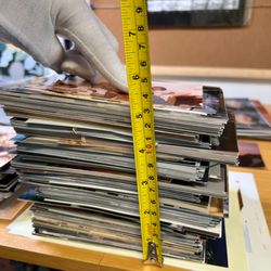 Picture Sprout - Measuring stacked photos allows us to estimate the size of the project.