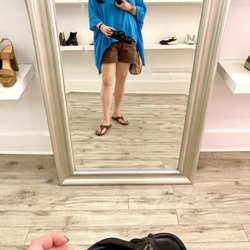 Hampden Clothing - These black sandals I'm holding are over $500...Cute, but not THAT cute!