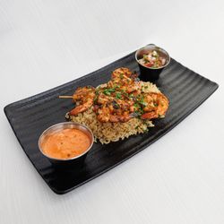 Skyline Bistro - Our Shrimp Skewers are served on a bed of Rice Pilaf