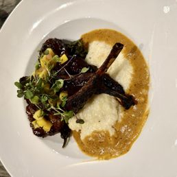 Lamb Chop Sunrise w/ Grits & Collard Greens 7/10 Lamb Chop Sunrise w/ Grits & Collard Greens 7/10