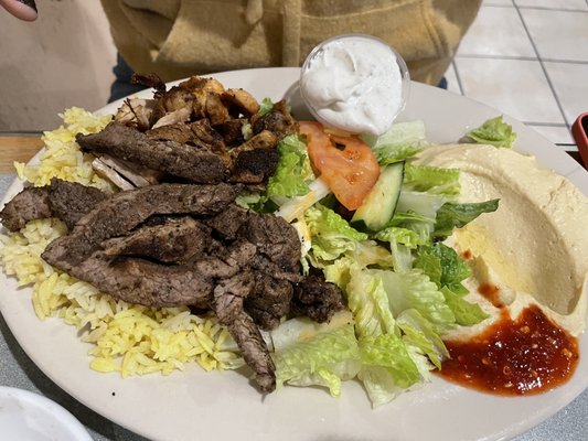 Photo of Holy Land Cafe - Lenexa, KS, US. 1. Chicken Shawarma, Beef Shawarma , Hummus, Rice, Greek Salad, and Pita Lunch