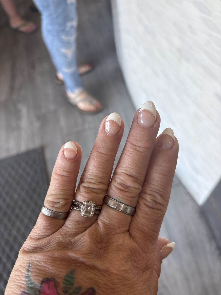 Nail Salon First Logo