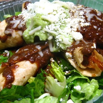Taqueria Talavera - Freshly rolled and fried chicken taquitos topped with mole sauce, guacamole, and queso fresco - Mexican Near Me - Berkeley, California Taqueria Talavera - Freshly rolled and fried chicken taquitos topped with mole sauce, guacamole, and queso fresco - Mexican Near Me - Berkeley, California