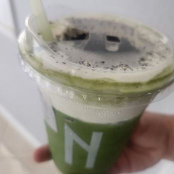 Nostimo Cafe & Tea - Black Sesame Cream Matcha Lattee with Oat milk. 75% sugar - Coffee & Tea Near Me - Westminster, California Nostimo Cafe & Tea - Black Sesame Cream Matcha Lattee with Oat milk. 75% sugar - Coffee & Tea Near Me - Westminster, California