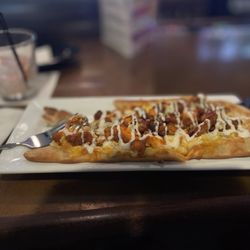 Octoraro Hotel & Tavern - Buffalo chicken flatbread with bacon.