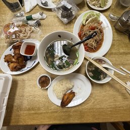 Fried chicken, sticky rice, papaya salad, fried liver, beef soup Fried chicken, sticky rice, papaya salad, fried liver, beef soup