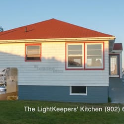 the lighthouse on cape d'or - Exterior of restauraunt at Cape D'Or.