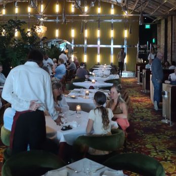 Le Coq - Partial view of the dining area - French Near Me - La Jolla, California