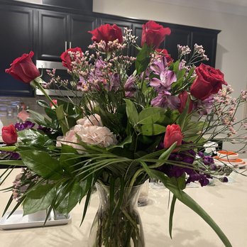 Betty J's Florist - The same Bouquet, different engle to show it was not arranged at all, just 7 rises and a bunch of greens for $175, very disappointed - Florists Near Me - Winter Garden, Florida Betty J's Florist - The same Bouquet, different engle to show it was not arranged at all, just 7 rises and a bunch of greens for $175, very disappointed - Florists Near Me - Winter Garden, Florida