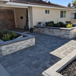 Three planters with rock facing plus paver walkway and entryway. Three planters with rock facing plus paver walkway and entryway.