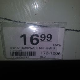 Price label for a 3x15-inch black hardware net with 1/2-inch mesh at Menards, priced at $16.99.