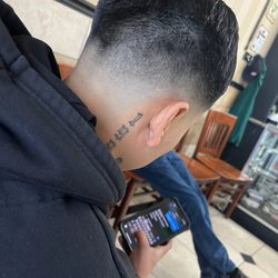 Frank's Barber Shop - Bald spot / hairline not straight.