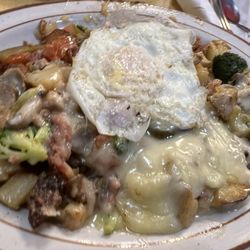 Billy Schu's Food Bar - Billy's home-fries with a fried egg on top