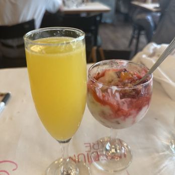 Medium Rare - Mimosa and yogurt parfait - Steakhouses Near Me - Houston, Texas Medium Rare - Mimosa and yogurt parfait - Steakhouses Near Me - Houston, Texas