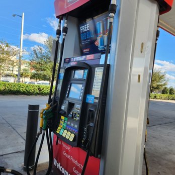 RaceTrac - a gas pump at a gas station - Gas Stations Near Me - Orlando, Florida