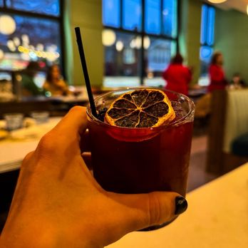 Maple Ridge Grocer - a person holding a drink - Breakfast & Brunch Near Me - Tulsa, Oklahoma