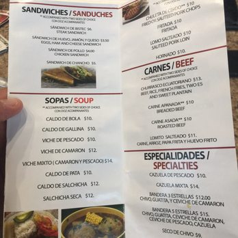 Cabo Restaurant - a hand holding a menu - Latin American Near Me - Guttenberg, New Jersey Cabo Restaurant - a hand holding a menu - Latin American Near Me - Guttenberg, New Jersey