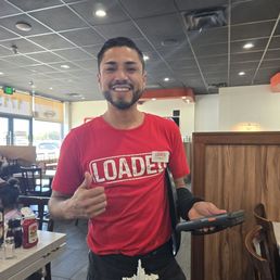 Uriel our amazing friendly waiter! Uriel our amazing friendly waiter!