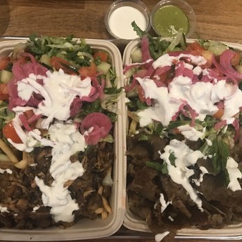 The Kebab Shop - Boxes with carved chicken (left), carved lamb and beef (right). Both with fries as a base. - Mediterranean Near Me - Austin, Texas The Kebab Shop - Boxes with carved chicken (left), carved lamb and beef (right). Both with fries as a base. - Mediterranean Near Me - Austin, Texas