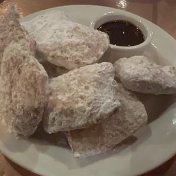 Pat O'Brien's - Bag O' Beignets (I put them on the plate) - Bars Near Me - Orlando, Florida Pat O'Brien's - Bag O' Beignets (I put them on the plate) - Bars Near Me - Orlando, Florida