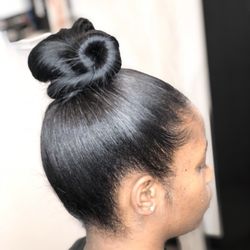 Shawn D Hair Studio - Sleek Ponytail done on natural hair.