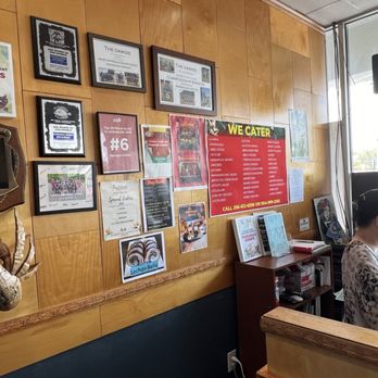 Marianas Grinds - At the check in/out counter. Note that Marianas Grinds caters! - Hawaiian Near Me - Jacksonville, Florida Marianas Grinds - At the check in/out counter. Note that Marianas Grinds caters! - Hawaiian Near Me - Jacksonville, Florida