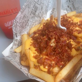 Charleys Cheesesteaks - Large friend with cheese and back and a strawberry lemonade reg size - Sandwiches Near Me - National City, California Charleys Cheesesteaks - Large friend with cheese and back and a strawberry lemonade reg size - Sandwiches Near Me - National City, California