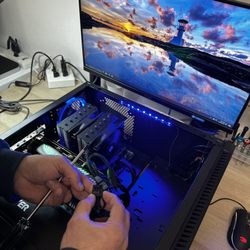 Tech Boys - Checking connections in the computer