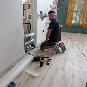 Couple Handymen - Installing new baseboards. Ilya cut perfect accent corners to wrap around the bullnose corners. - Handyman Near Me Couple Handymen - Installing new baseboards. Ilya cut perfect accent corners to wrap around the bullnose corners. - Handyman Near Me