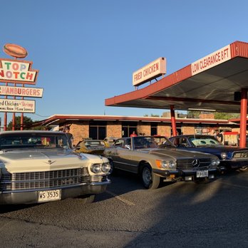 Top Notch - several classic cars parked in front of a gas station - Fast Food Near Me - Austin, Texas Top Notch - several classic cars parked in front of a gas station - Fast Food Near Me - Austin, Texas