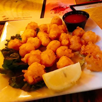 Poor Phil's Shell Bar - Lobster bites! Delicious nuggets of lobstah meat served with cocktail sauce and lemon wedge - American Near Me - Oak Park, Illinois