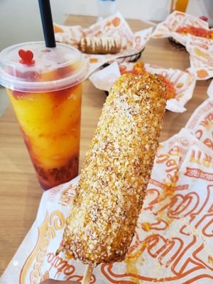 Two Hands Corn Dogs by null