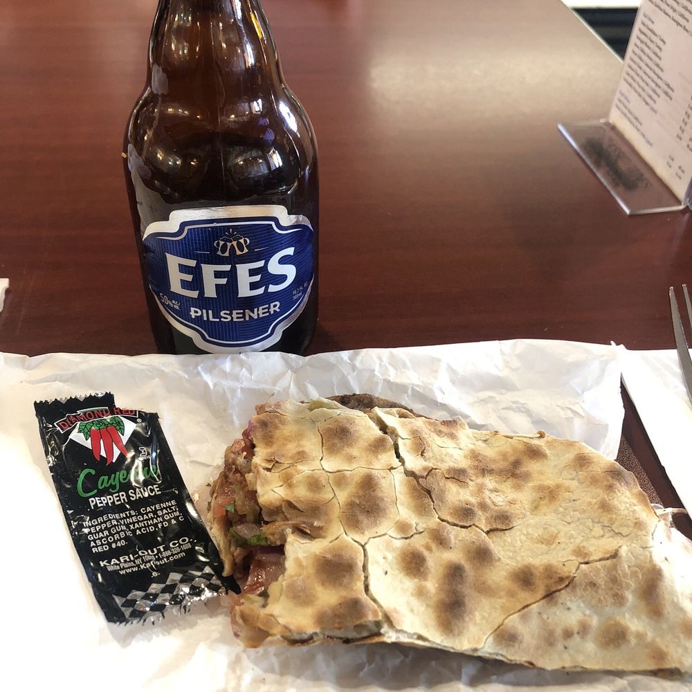 A La Turca - Lahmacum-crispy wrap w/ beef & purple onions & tomato w/ a vinaigrette type hot sauce (something like crystals & Efes (turkish pilsner) - Turkish Near Me - San Francisco, California
