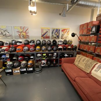 Moto Coffee Machine - a room full of helmets - Coffee & Tea Near Me - Hudson, New York
