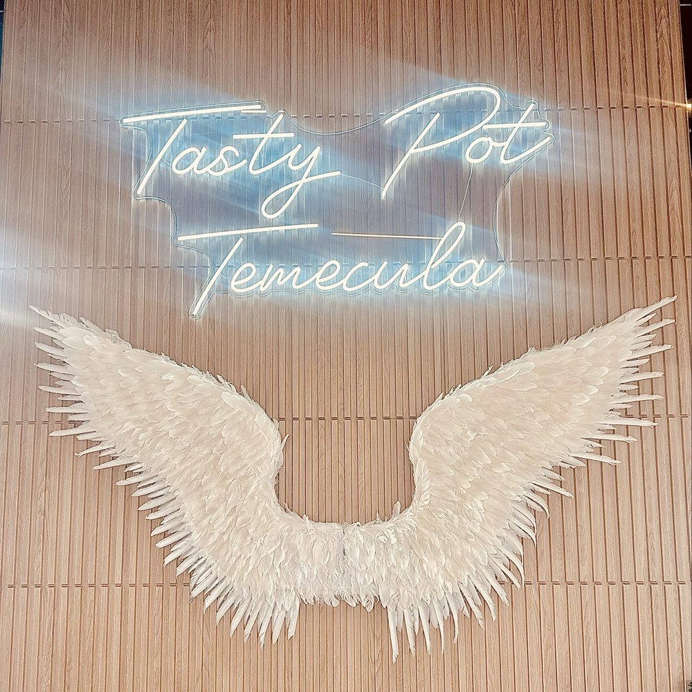 Tasty Pot - Fun and Adorable Angel Wings wall to take pics with family and friends. - Hot Pot Near Me - Temecula, California Tasty Pot - Fun and Adorable Angel Wings wall to take pics with family and friends. - Hot Pot Near Me - Temecula, California
