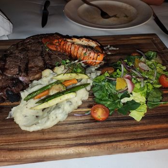 La Concha - surf and turf meal from Seaside restaurant..Subbed the New York strip for a ribeye. Small lobster tail but it was all good. - Hotels Near Me - La Paz, BCS