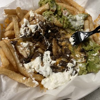 Stuffed - Asada Cali Fries - where is the MEAT!? For $17dlls in a TO GO order.... ROBBERY. - Mexican Near Me - San Antonio, Texas