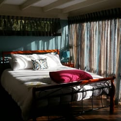 Back 2 Earth - Accommodation. Queen sized bed, comfortable linen.