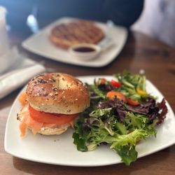 La Terraza Cafe - Smoked Salmon (Lox) Bagel Sandwich and plain Buttermilk Waffle with butter & maple syrup