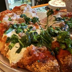 Polpo Restaurant & Saloon - Broccoli, rob and sausage (personal) pizza at the bar