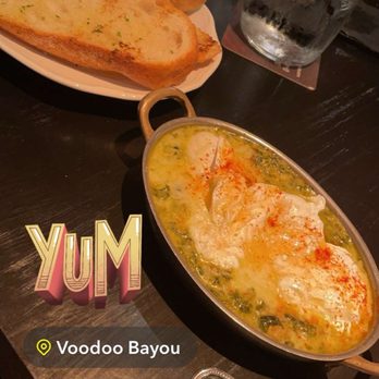Voodoo Bayou - Baked "eggs sardou" - Cocktail Bars Near Me - Orlando, Florida Voodoo Bayou - Baked "eggs sardou" - Cocktail Bars Near Me - Orlando, Florida