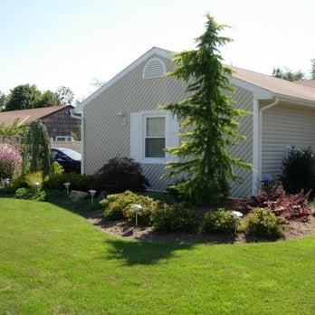 Kaste Landscape & Design - the front yard of a home - Landscaping Near Me - Bohemia, New York Kaste Landscape & Design - the front yard of a home - Landscaping Near Me - Bohemia, New York